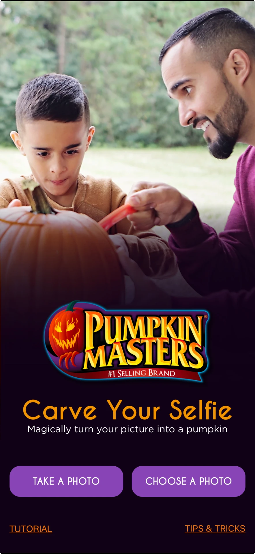 Pumpkin Masters Carve Your Selfie app home screen showing Take a Photo and Choose a Photo buttons